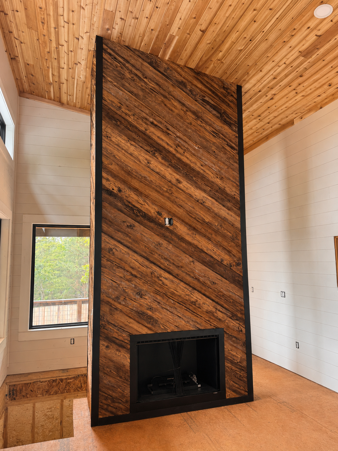 Cozy Up This Fall with a Reclaimed Wood Fireplace Accent