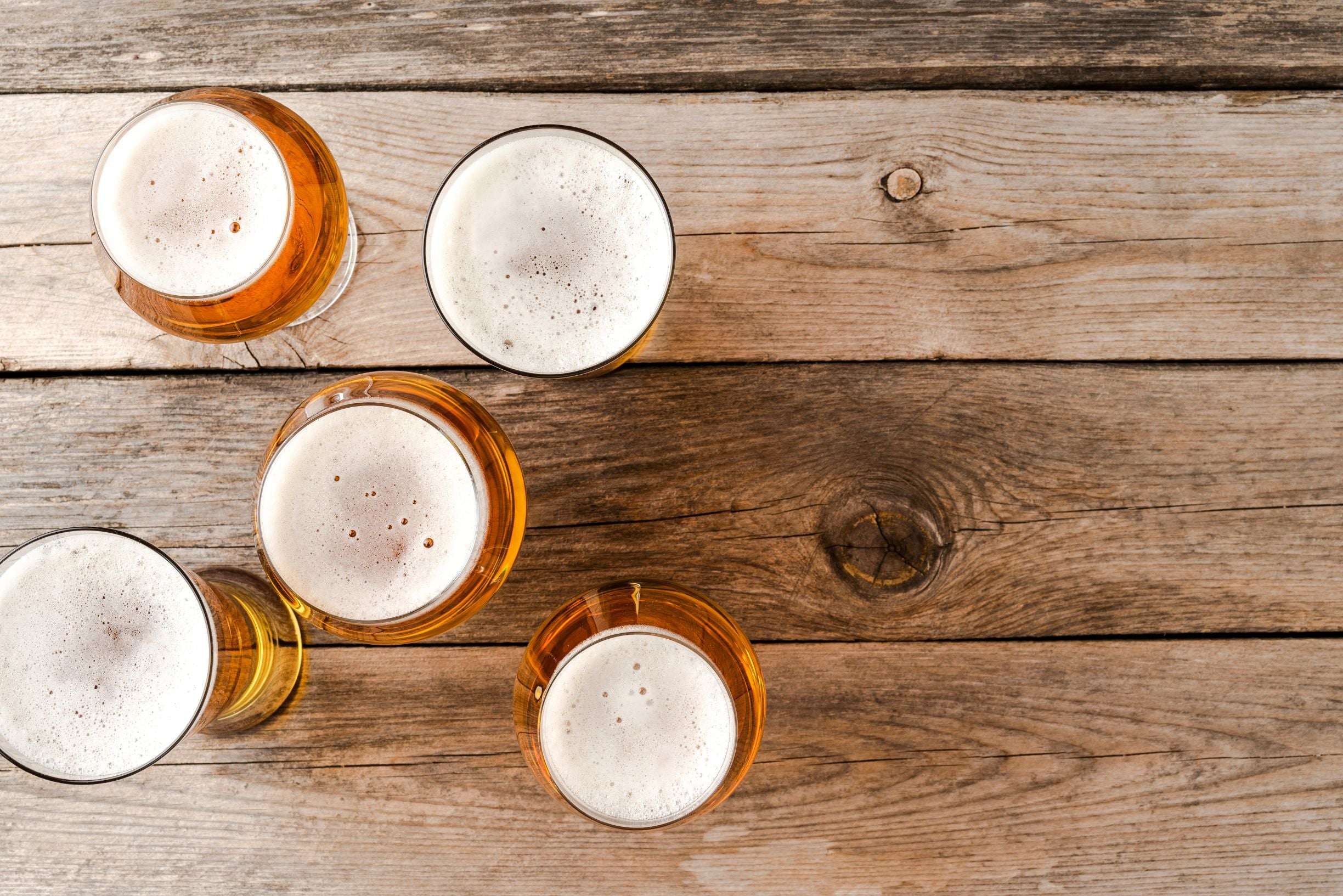 Wooden pallet bar holding beer.