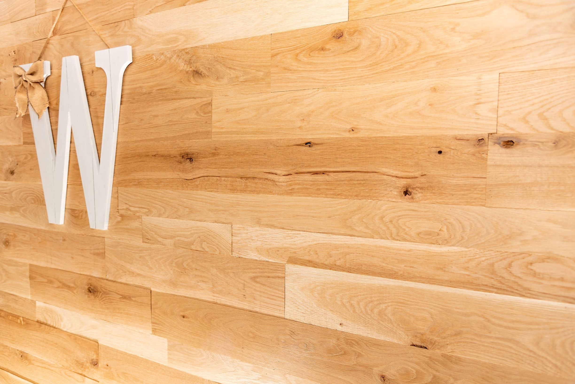 Rustic white oak wood DIY bedroom wall.