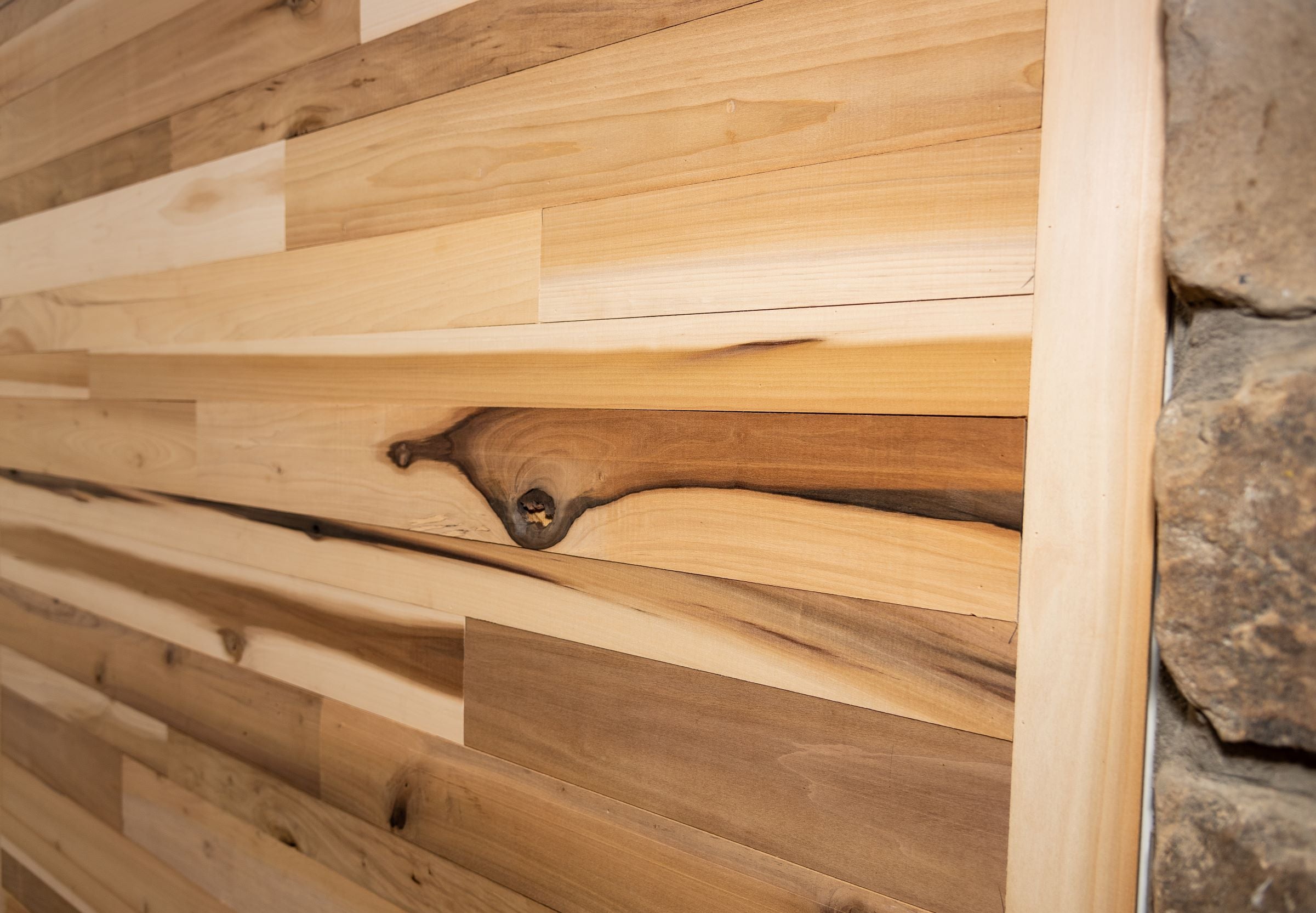 Reclaimed mineral poplar wood plank wall.