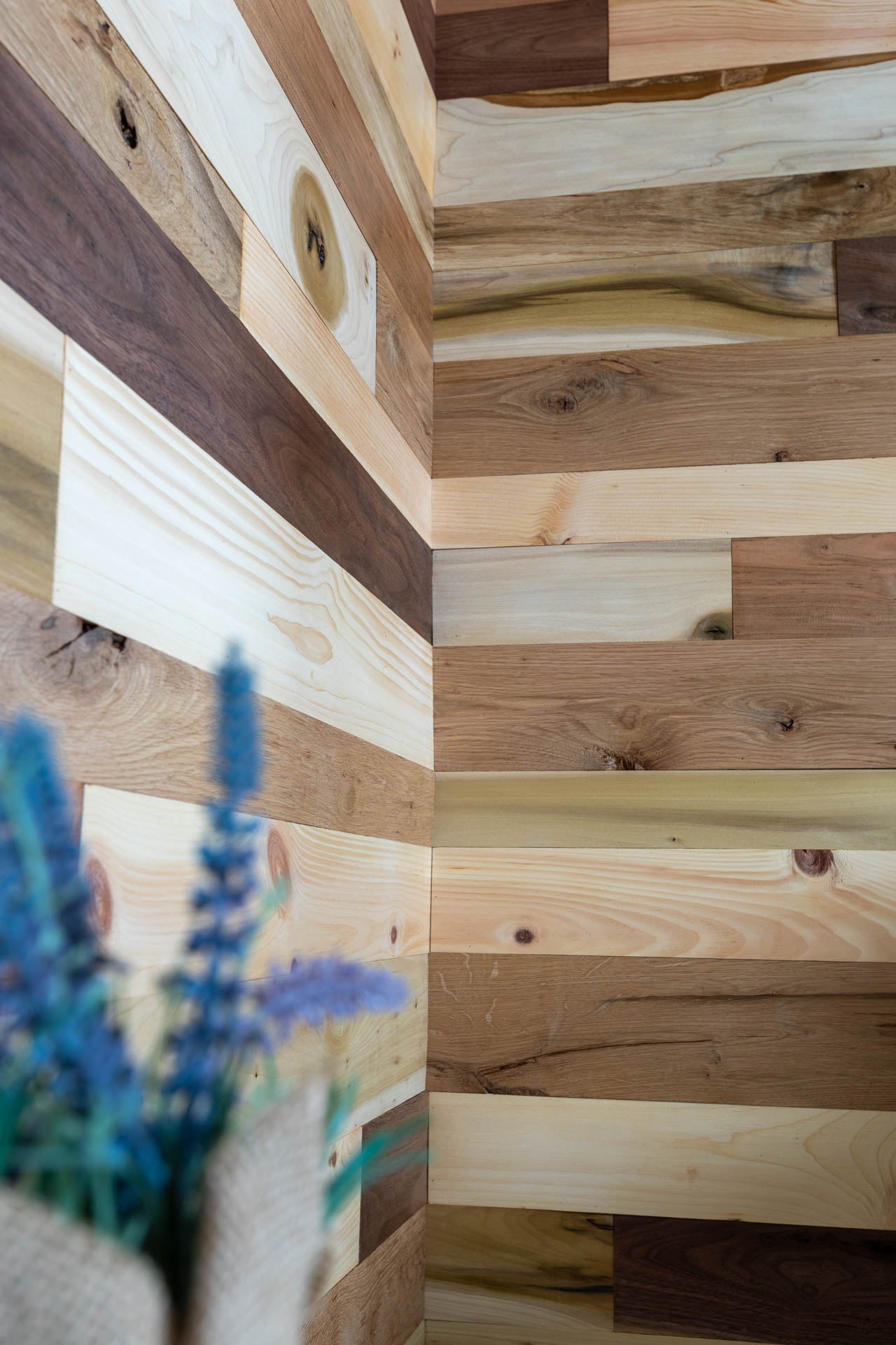 Vintage multicolored reclaimed wooden plank walls.