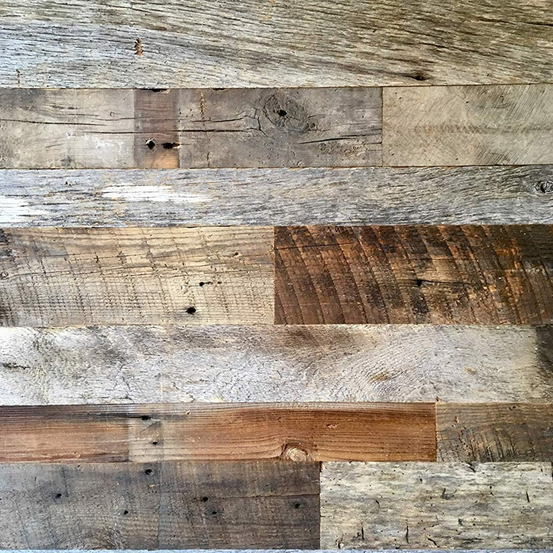 Premium vintage reclaimed barn wood wall.