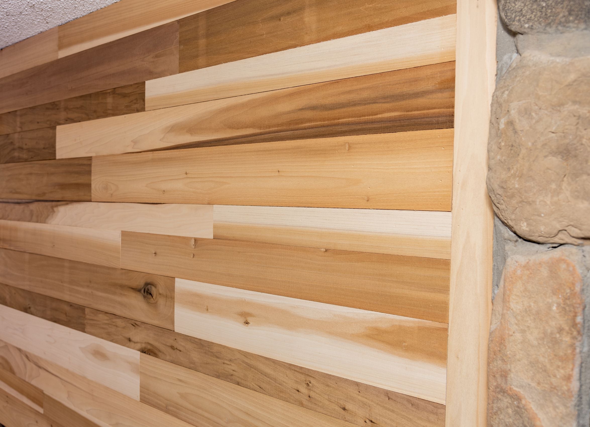 Reclaimed mineral poplar wood plank wall.